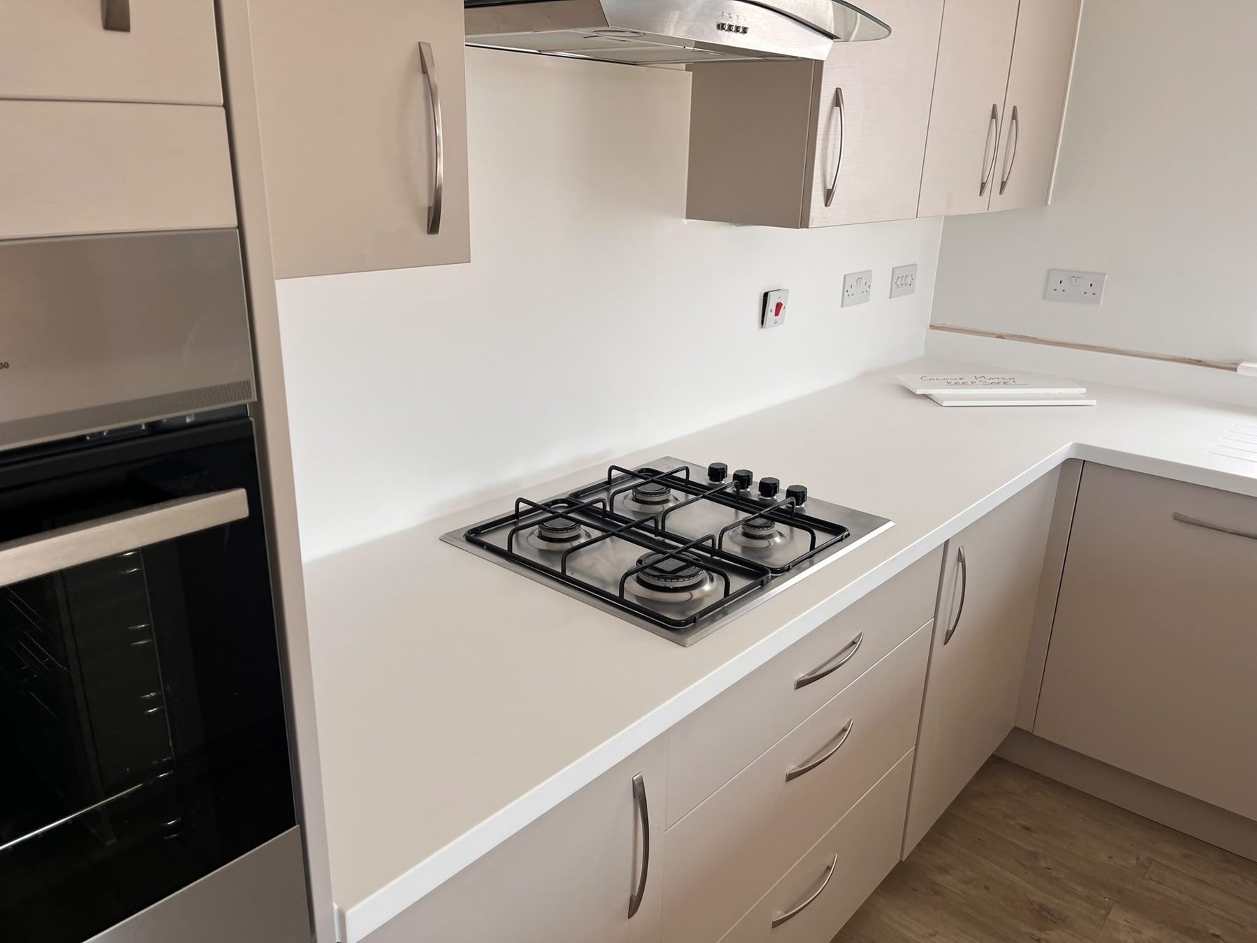 Seamless white solid surface run with matching upstand